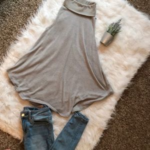 Sleeveless gray turtleneck sweater